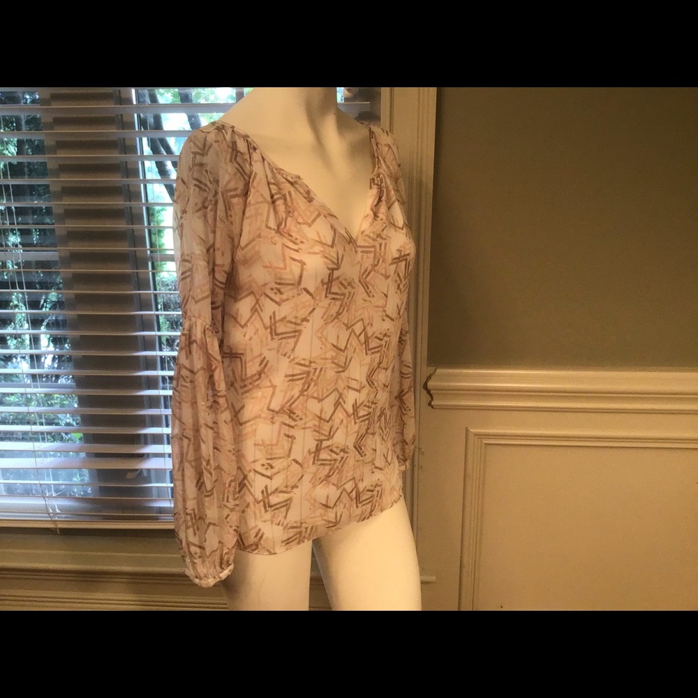 WHBM blouse, feminine with modern design. Size 0